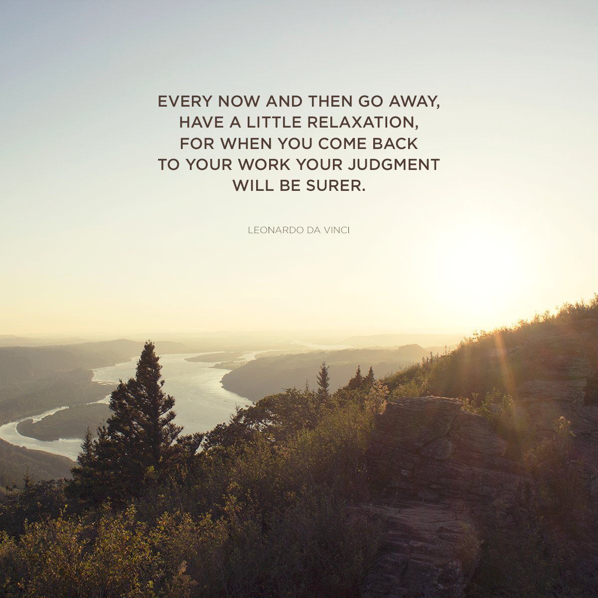 Quote over a river valley at sunrise