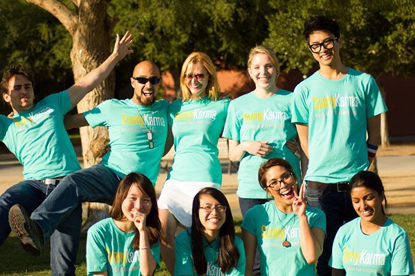 The SunnyKarma team in the shirts Diana designed